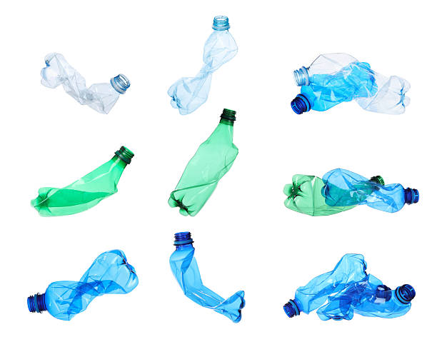 istock Many crumpled plastic bottles on white background, collage 2235326472
