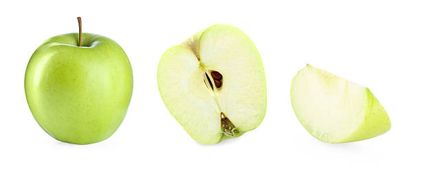 istock Whole and sliced green apple isolated on white 2235326489