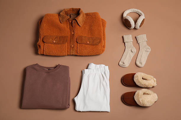 istock Stylish clothes, boots and accessories on beige background, flat lay 2235326621
