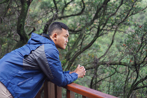 istock Man Posing in Forest Outdoors 2235327549
