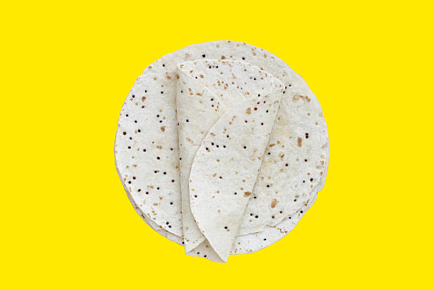 Quinoa tortilla wraps on yellow background