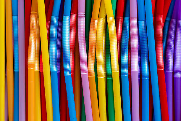 istock Close-Up View of Colorful Plastic Drinking Straws. Vertical Abstract Background. 2235343723