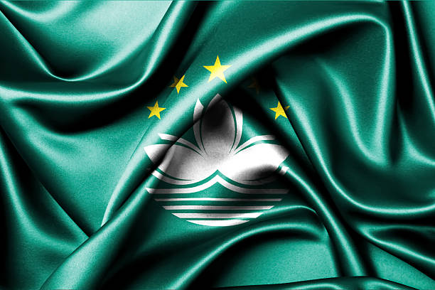Close-up of the Macau national flag fluttering in the wind. 3D illustration. Flags.