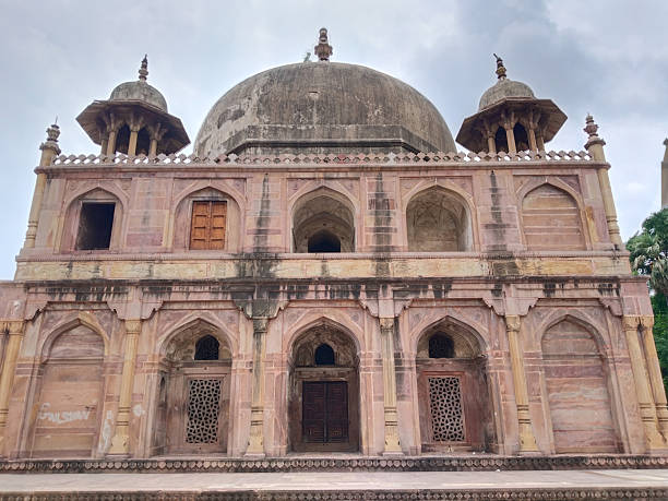 Historical Mughal-era tomb of Khusrau Mirza in Khusro Bagh, Prayagraj, India, showcasing intricate sandstone architecture and Indo-Islamic design elements.