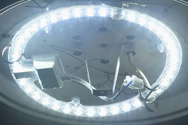 istock LED electric lamp hanging on ceiling room 2235347642