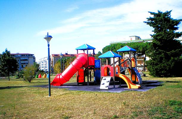 istock A colorful children's carousel in a public park 2235353359