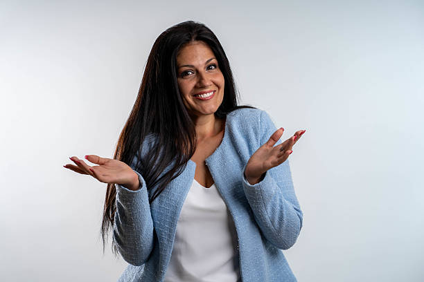 istock Confused businesswoman looking at camera 2235354187