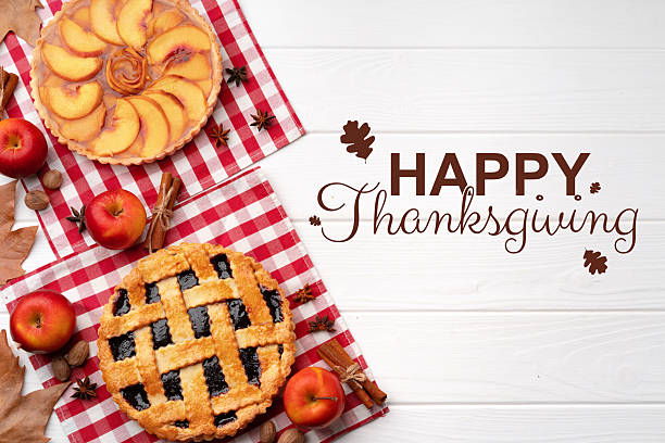 istock Festive Thanksgiving desserts on display with seasonal decorations and apples 2235361836
