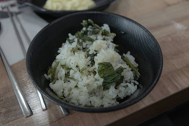 This collection of photographs showcases the delicious local cuisine of Danyang, a city in South Korea known for its garlic specialties. The images feature tteokgalbi (grilled short rib patties) and soondae-guk (sausage soup) served with various traditional side dishes. This visual is perfect for projects on Korean food, travel, and authentic dining experiences.
