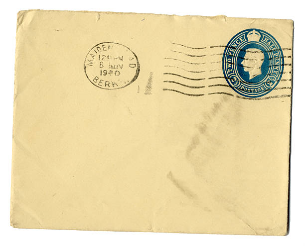 A cream coloured envelope posted in Maidenhead, Berkshire, England in 1940. The blue printed tuppence-halfpenny postage stamp bears the profile of King George VI.