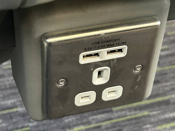istock Close-Up of USB Charging Ports and UK Plug Socket for Convenient Device Charging on a Train 2235370800