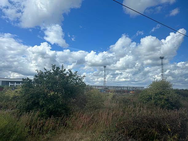 istock Countryside View with Open Field and Dramatic Cloudy Sky 2235370953
