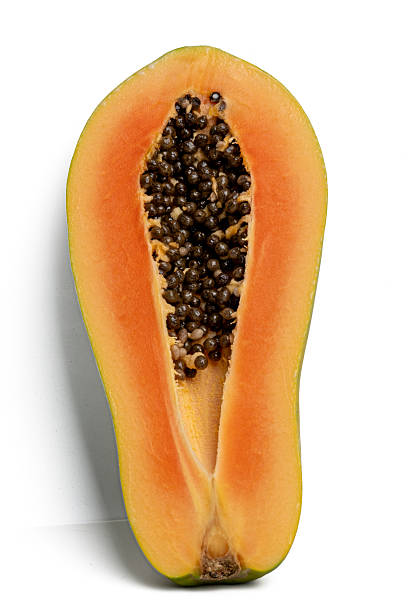 Photo of papaya taken with a high-resolution camera stacking focus technic using on a white background.
