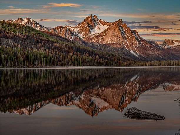 istock Sunrise over Stanley Lake with mountain reflection 2235378327