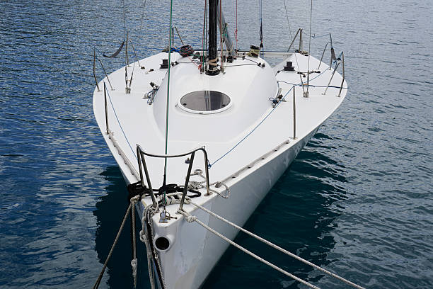 white yacht in the harbor of the coastal city
