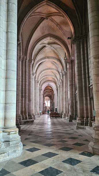 istock Beautiful architectural perspective inside the Sens Cathedral (the first gothic cathedral in the history of Christianity) 2235380334