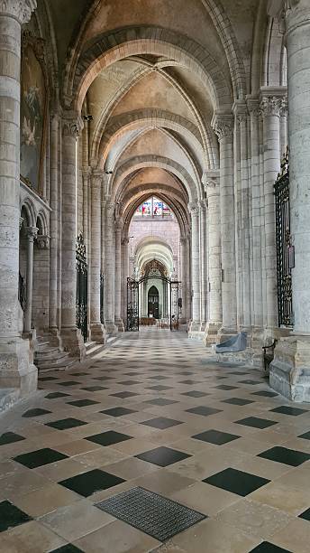 istock Beautiful architectural perspective inside the Sens Cathedral (the first gothic cathedral in the history of Christianity) 2235380364