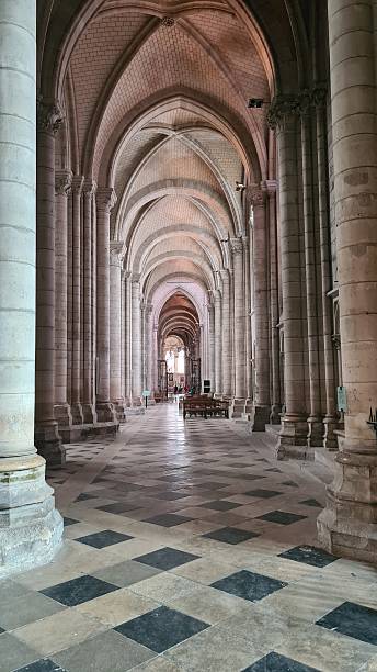istock Beautiful architectural perspective inside the Sens Cathedral (the first gothic cathedral in the history of Christianity) 2235380371