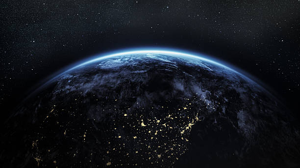 istock Planet Earth At Night With City Lights Seen From Space 2235383448
