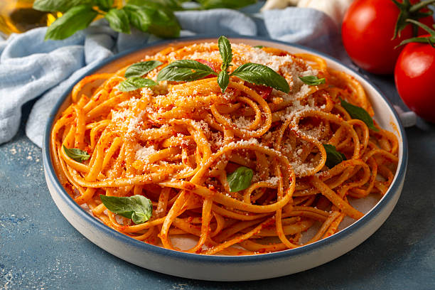 istock Flat spaghetti pasta with delicious tomato sauce and parmesan cheese. 2235389482