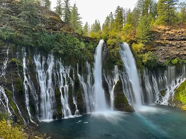 istock the burney falls waterfall is located within mcarthur-burney falls memorial state park (long exposure technique) 2235395182