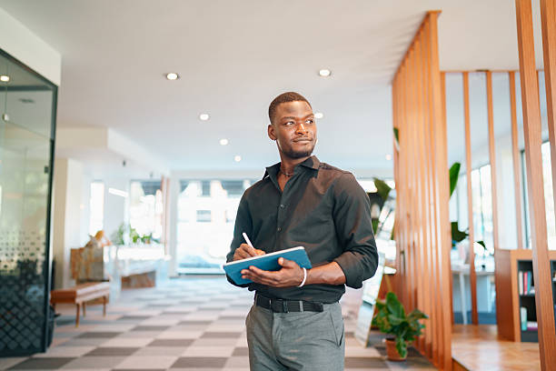istock Professional Man Using Digital Pen on Digital Tablet in Modern Office 2235395435