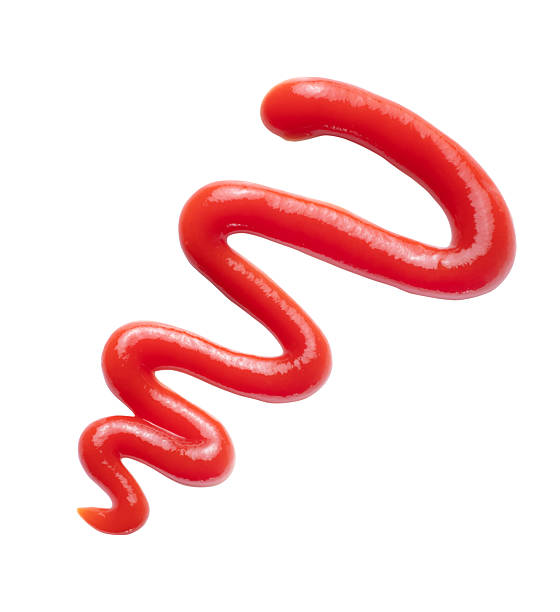 istock Abstract red ketchup swirl isolated on white background 2235405358