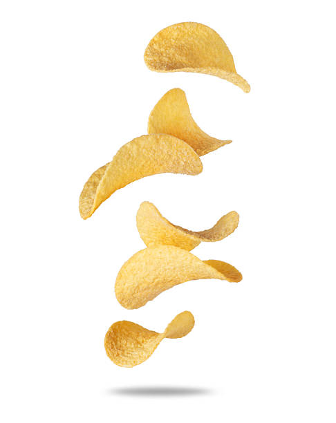 istock Delicious potato chips floating in the air closeup on white background 2235405359