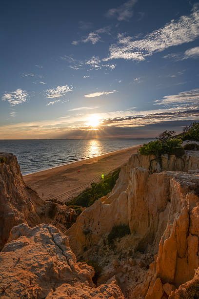 istock Sunset cliffs and beach in Mazagon, Huelva, Spain 2235405431