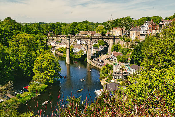 istock River with Stone Viaduct and Buildings  in Knaresborough, UK. 2235407909