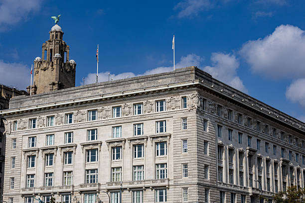 istock Stone Building with Tower and Flags  in Liverpool, UK. 2235408099