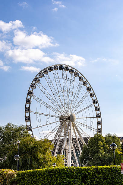 istock Ferris Wheel with Gondolas and Greenery  in Liverpool, UK. 2235408156