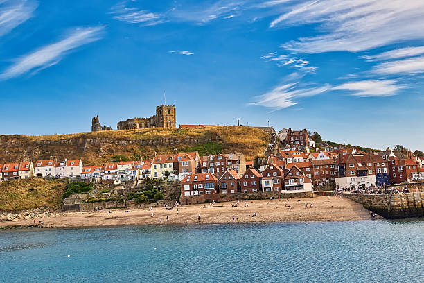 istock Coastal Town with Beach and Hillside Buildings  in Whitby, UK. 2235409630