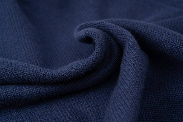 istock Navy blue merino wool sweater texture as background. Top view. 2235414477
