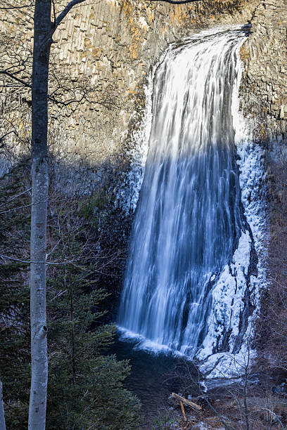 istock Ray Pic waterfall cascading down basalt columns in Pereyres, Ardeche, France 2235419108