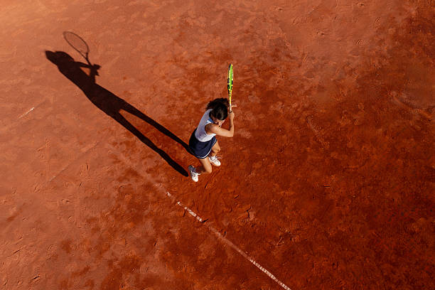 istock Overhead Drone Image of Tennis Player on Clay Surface 2235421075