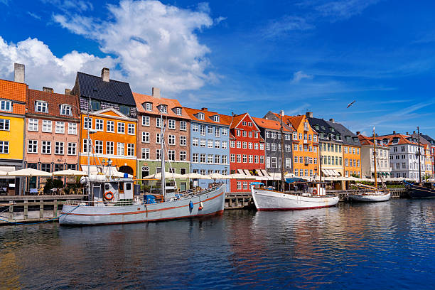 istock Nyhavn waterfront with reflections in Copenhagen Colorful Denmark 2235421737