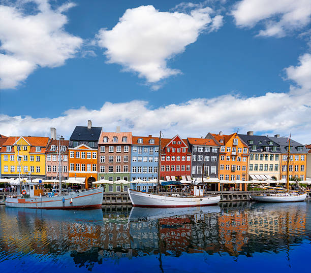 istock Nyhavn waterfront with reflections in Copenhagen Colorful Denmark 2235421775