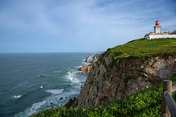 istock Cabo da Roca Lighthouse on Cliff Above the Atlantic Ocean, Sintra, Portugal 2235422555