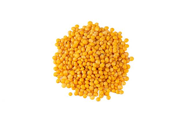 istock Yellow lentil on the white background 2235426317
