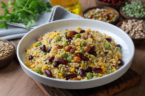 istock Bulgur pilaf with legumes; with peas, beans and corn kernels. 2235428028