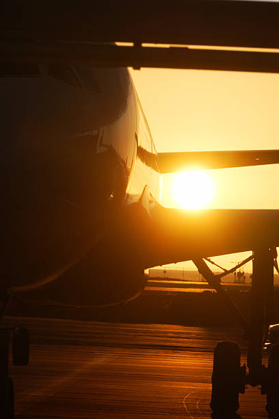 Passenger Jet on Tarmac at Sunset