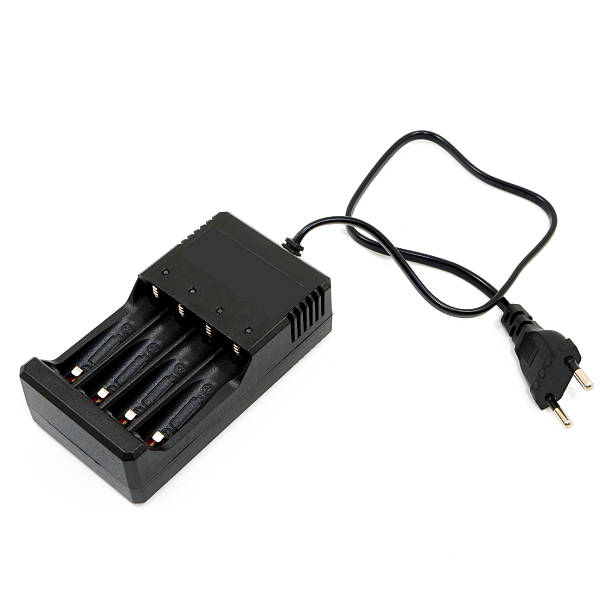 istock Battery recharger device isolated on white background close-up shot 2235432895