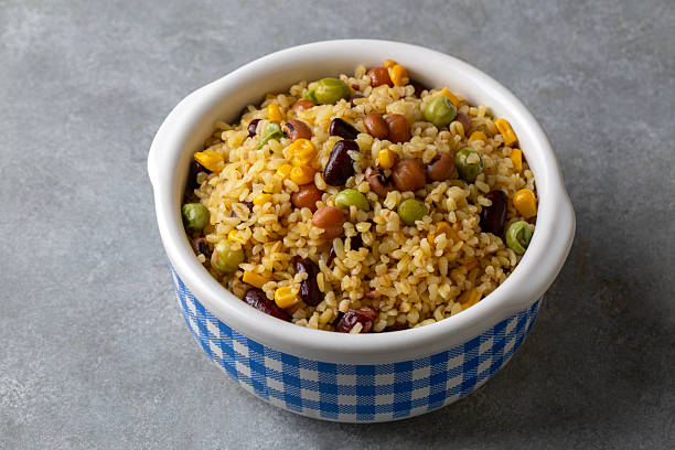 istock Bulgur pilaf with legumes; with peas, beans and corn kernels. 2235440075
