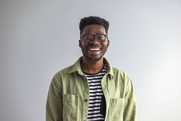 istock Smiling Man in Casual Outfit Against Neutral Background 2235444849