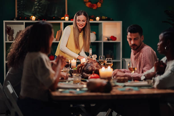 istock Friends celebrating thanksgiving dinner at home 2235447461