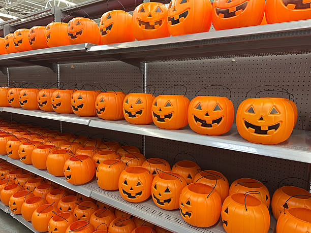 istock Plastic pumpkins buckets ready for Halloween 2235452312