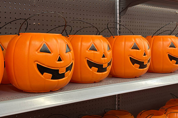 istock Plastic pumpkins buckets ready for Halloween 2235452398