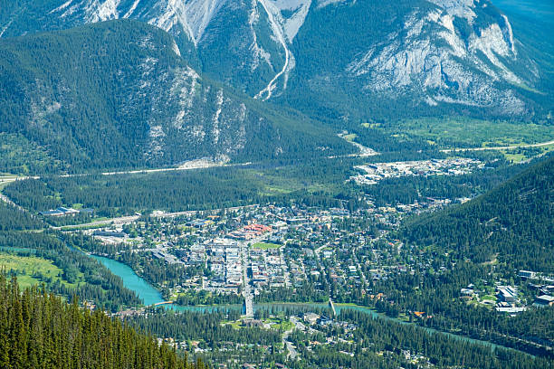 istock Scenic view of Banff surrounded by mountains and greenery on a sunny day 2235453046