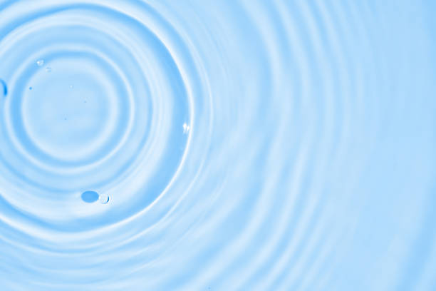 istock Abstract transparent water shadow surface texture natural ripple on blue background 2235453664